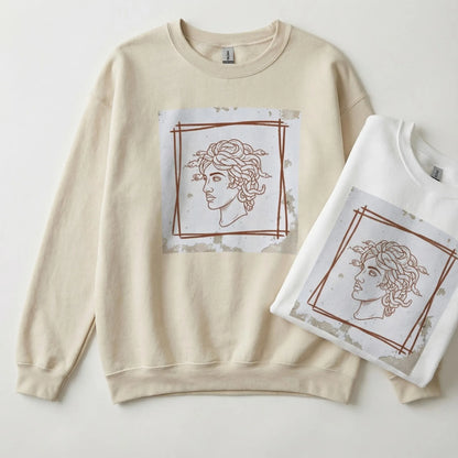 lat lay of Minimal Medusa sweatshirt in Sand and White colorways