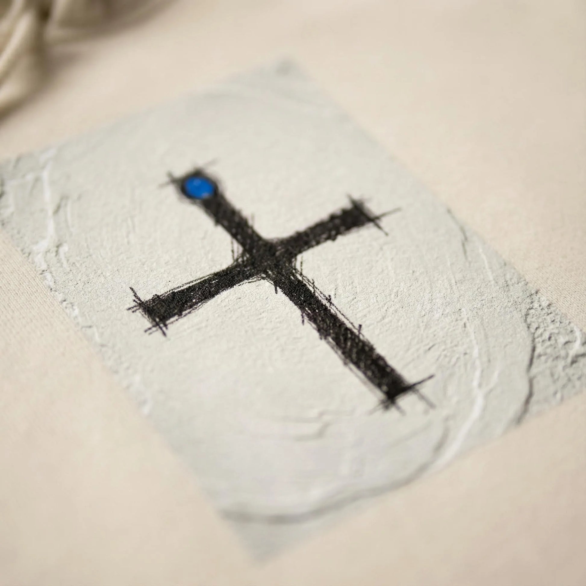 Close-up of DTG print texture on Pomos Idol hoodie