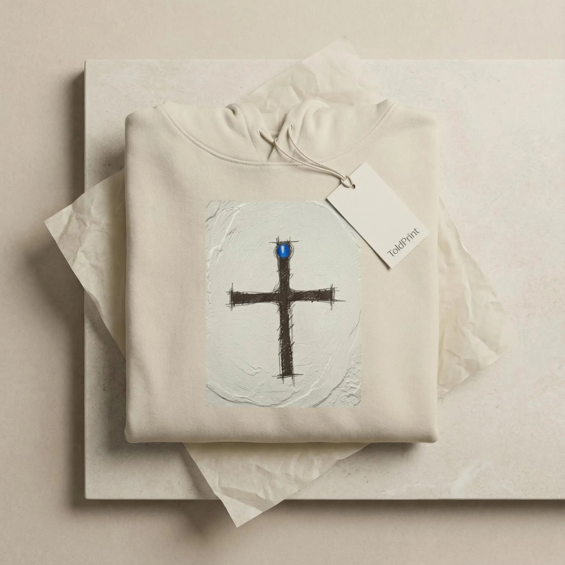 Folded Pomos Idol hoodie with minimal ToldPrint packaging