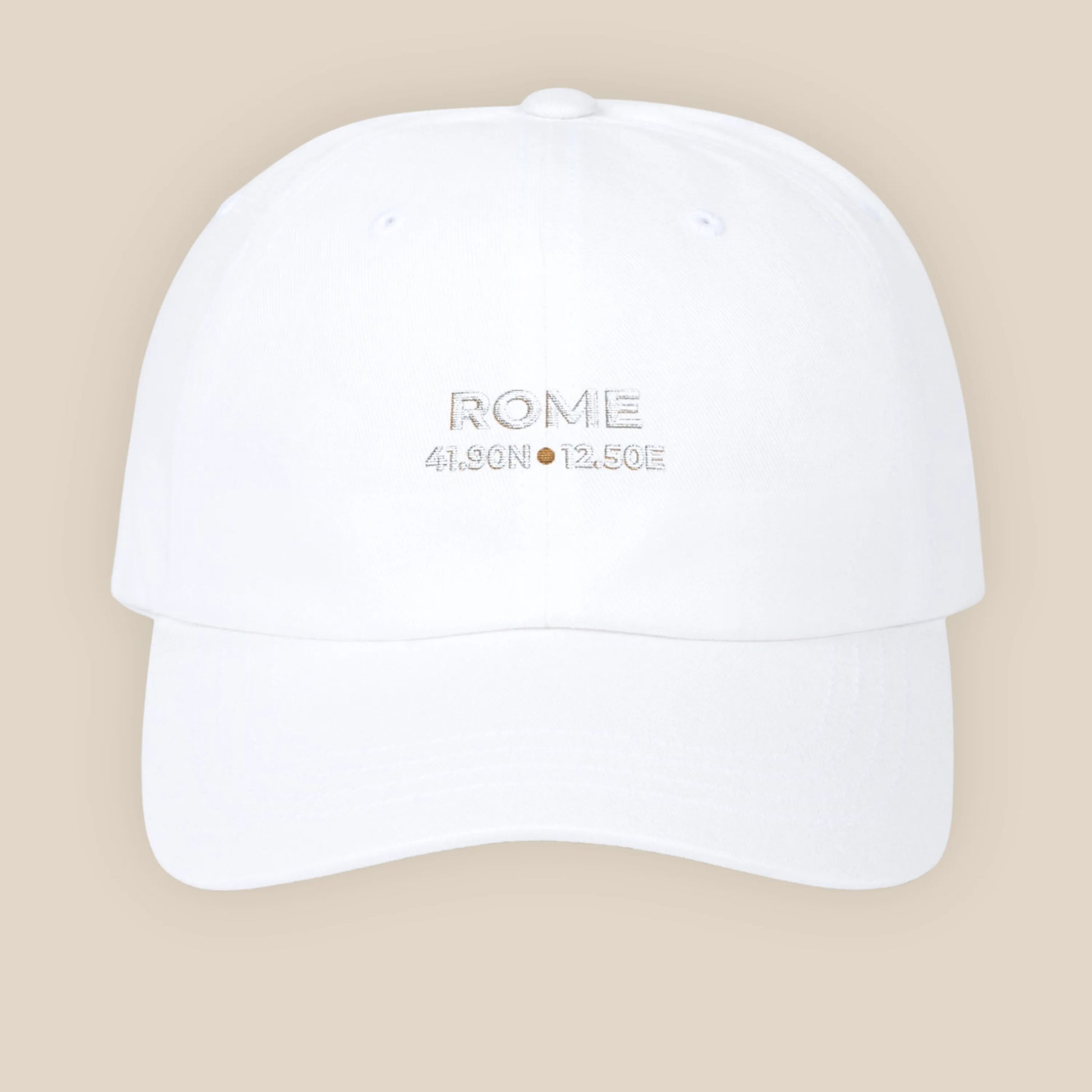 White cap with 'ROME' and coordinates on a beige background
