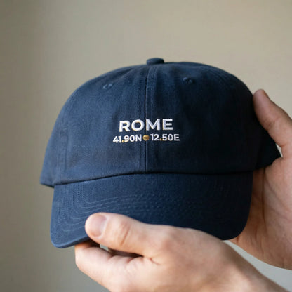 Close-up shot of the Rome coordinates dad cap held in hand.
Embroidery centered and sharp