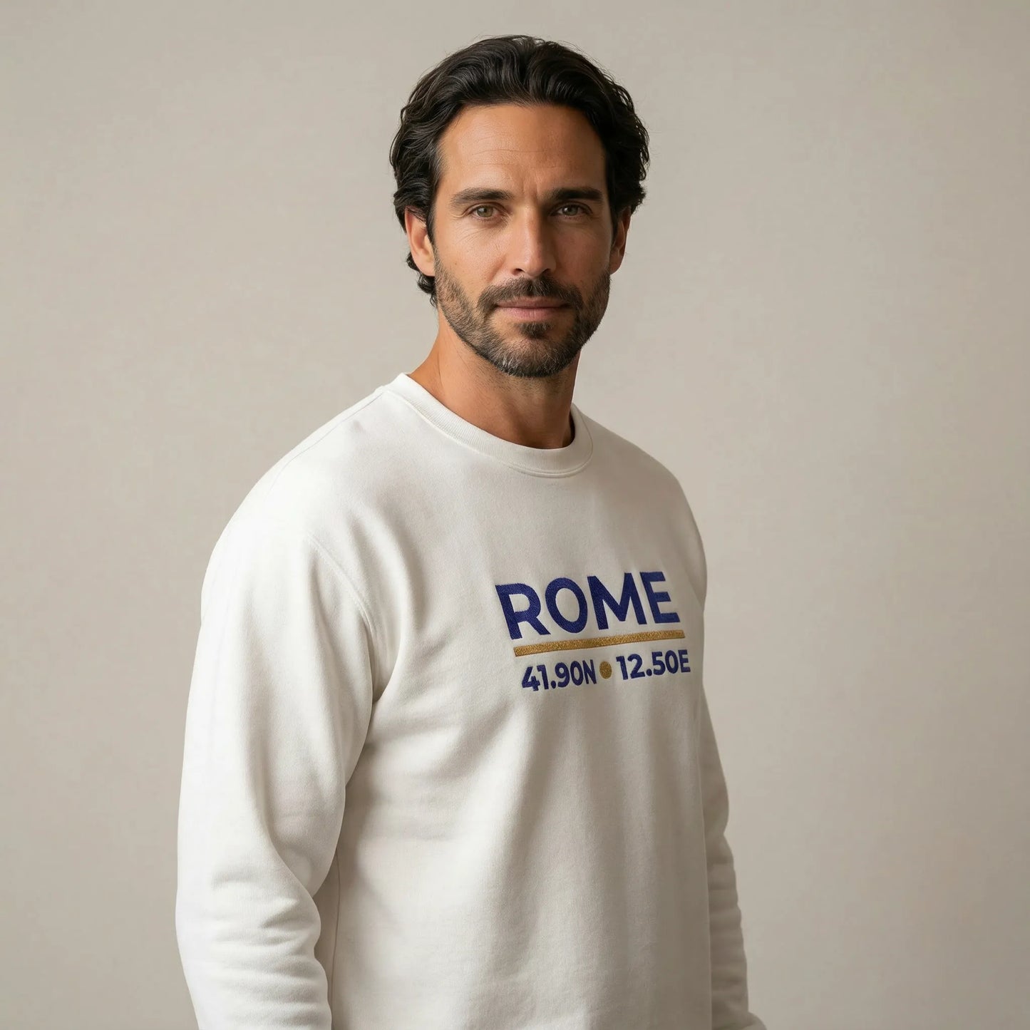Rome coordinates embroidered sweatshirt on male model, three-quarter studio angle