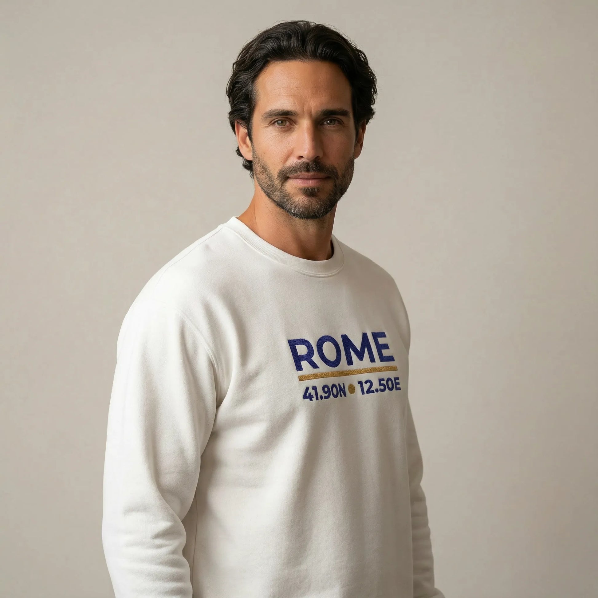 Rome coordinates embroidered sweatshirt on male model, three-quarter studio angle