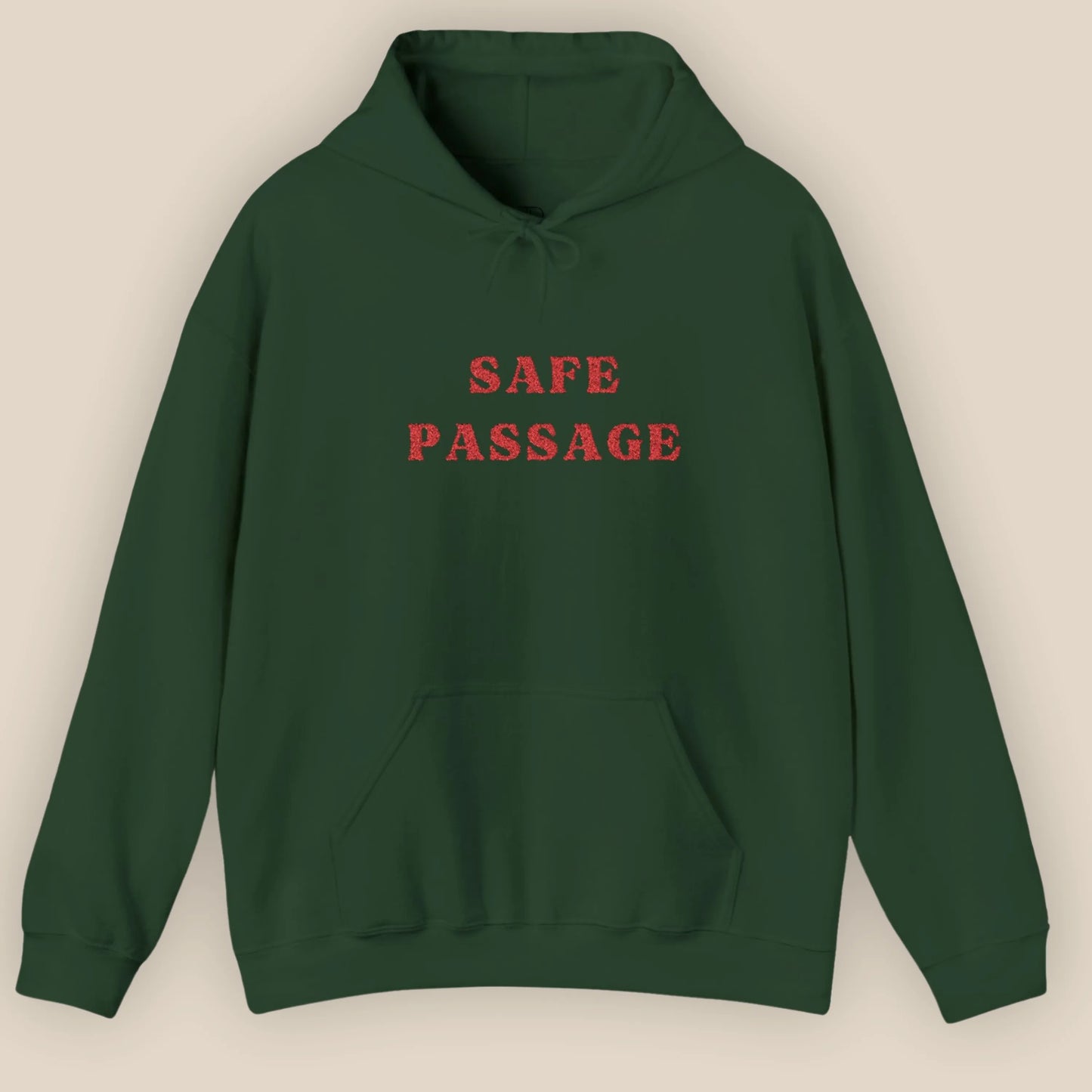 Flat lay of Safe Passage unisex hoodie showing full front embroidered slogan