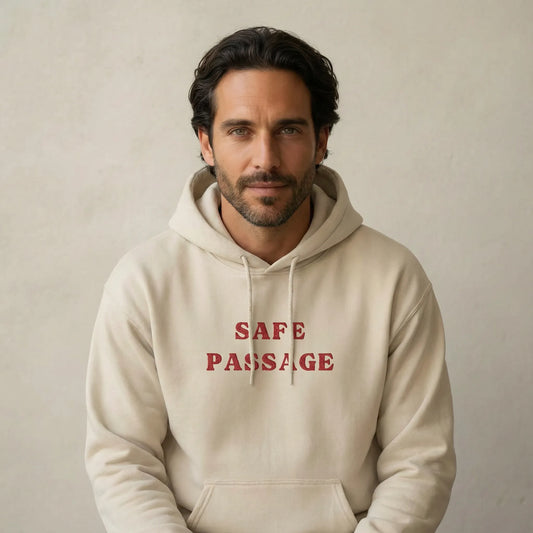 TP:HERO Front studio view of Safe Passage embroidered unisex hoodie with red slogan on chest