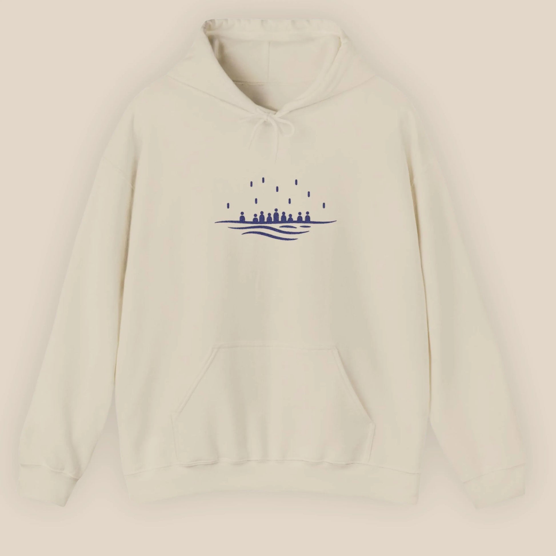 Flat lay of the sand Sea Crossing hoodie