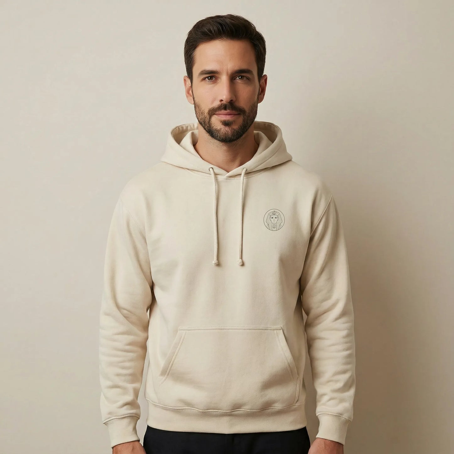 TP:HERO Front view of sand Sphinx hoodie showing small monoline Sphinx chest emblem and kangaroo pocket