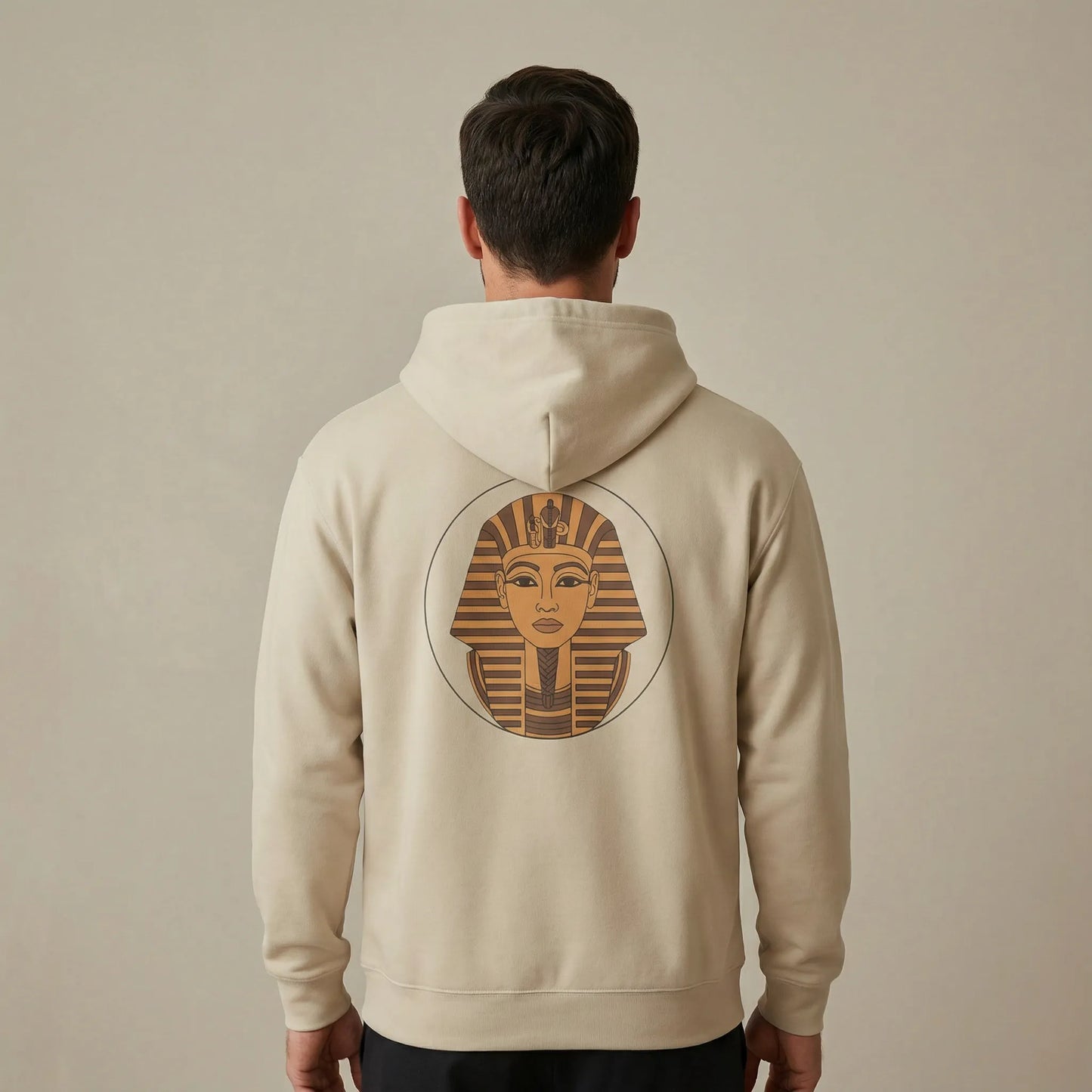 Sand Sphinx graphic hoodie with large Egyptian Sphinx badge printed on the back, unisex fit in studio setting