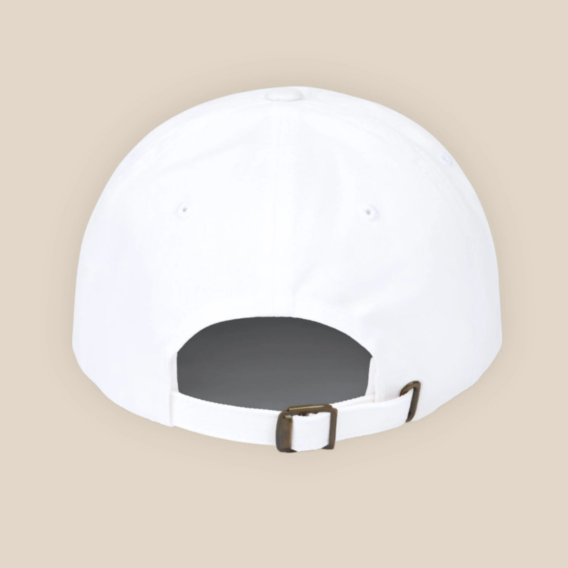 Back detail of white dad cap with adjustable strap and metal buckle, clean studio close-up