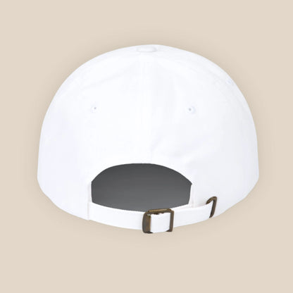 Back detail of white dad cap with adjustable strap and metal buckle, clean studio close-up