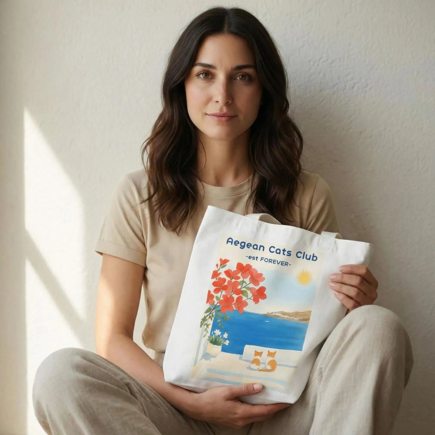 TP:HERO Model holding Aegean Cats Club cotton canvas tote bag by ToldPrint