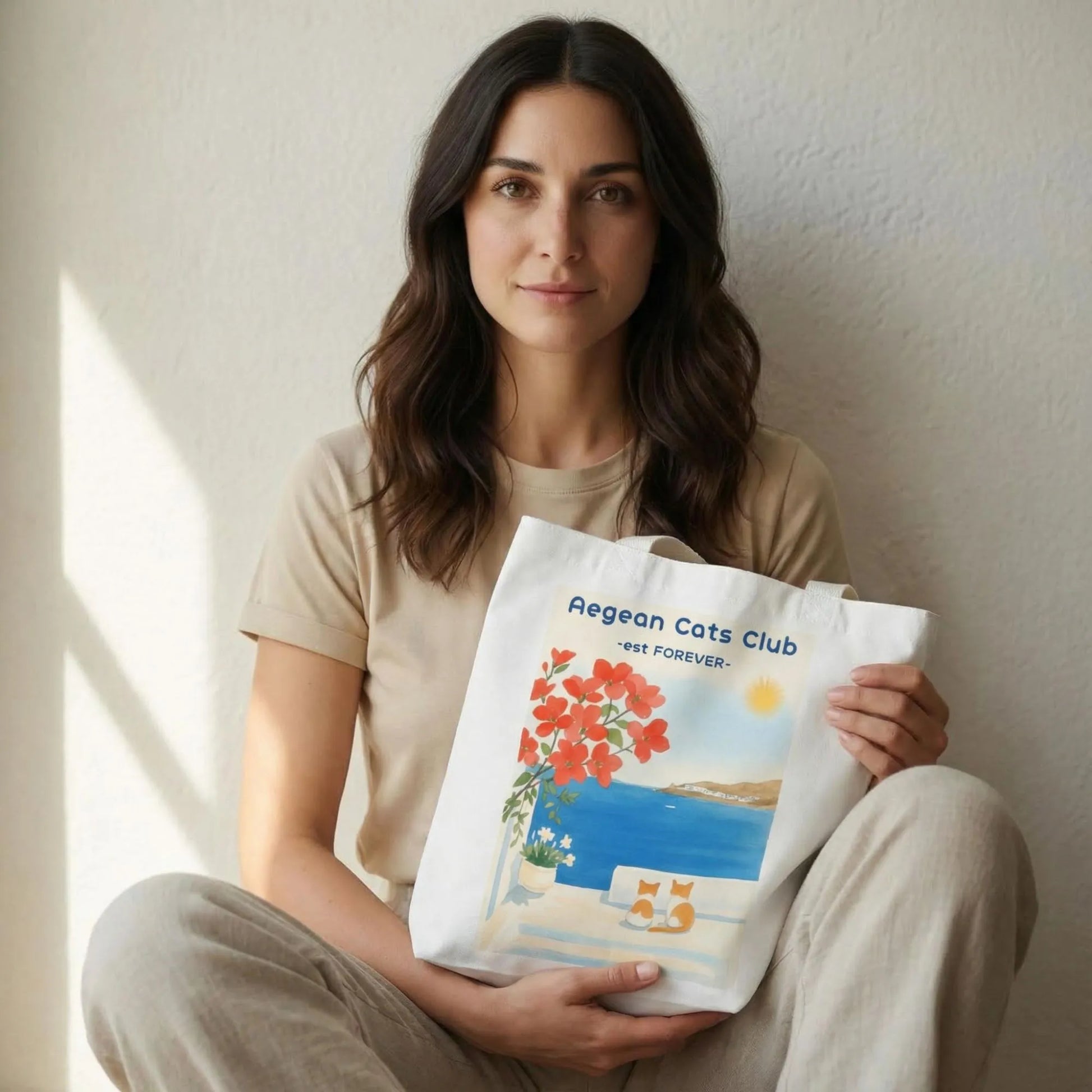 TP:HERO Model holding Aegean Cats Club cotton canvas tote bag by ToldPrint