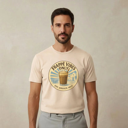 TP:HERO Model wearing Frappé Vibes Only Greek coffee t-shirt by ToldPrint in a calm Mediterranean studio setting