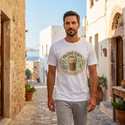 Frappé Vibes Only Greek coffee t-shirt styled on a model walking in a Mediterranean street