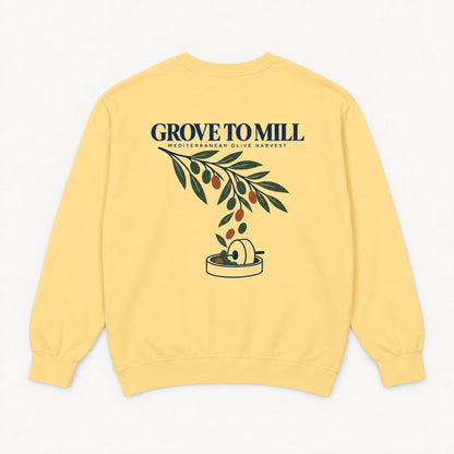 Butter Grove to Mill Comfort Colors 1566 sweatshirt shown from the back with the Mediterranean Olive Harvest olive-branch and millstone print.