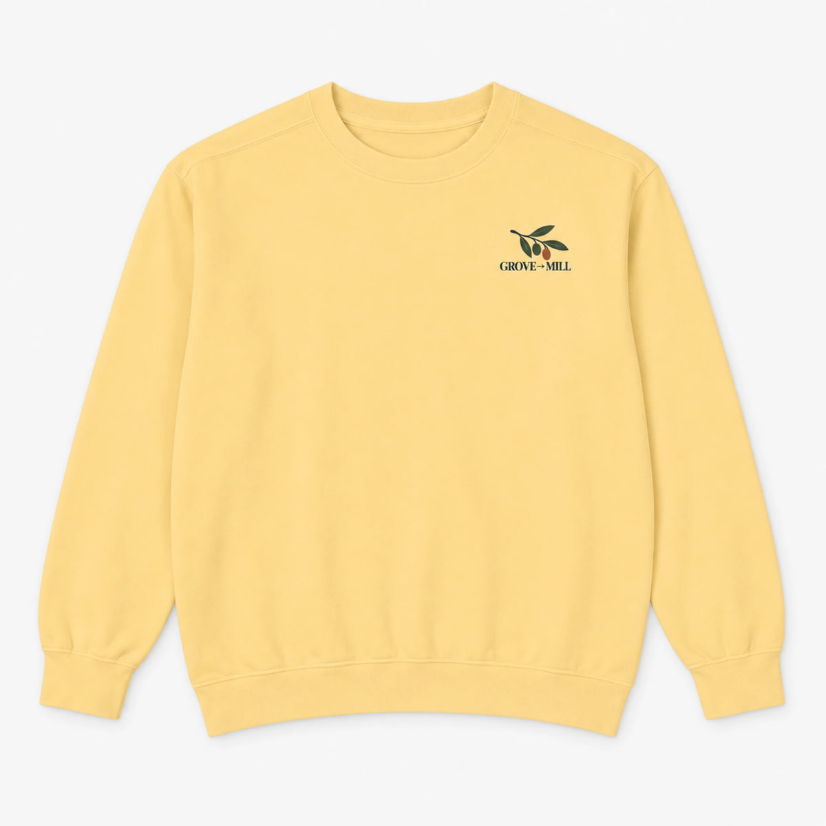 Butter Grove to Mill Comfort Colors 1566 sweatshirt flat lay, front view with the dark olive Grove to Mill left-chest print.