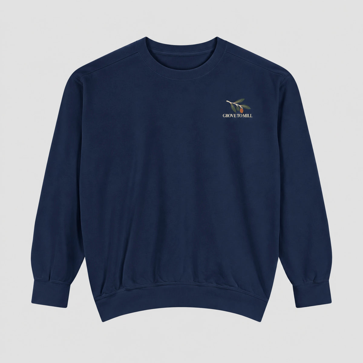 True Navy Grove to Mill Comfort Colors 1566 sweatshirt flat lay, front view with the small olive-branch Grove to Mill left-chest print.