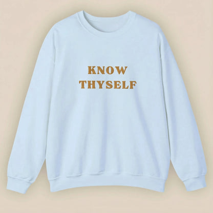 Light blue sweatshirt with 'KNOW THYSELF' text on a beige background