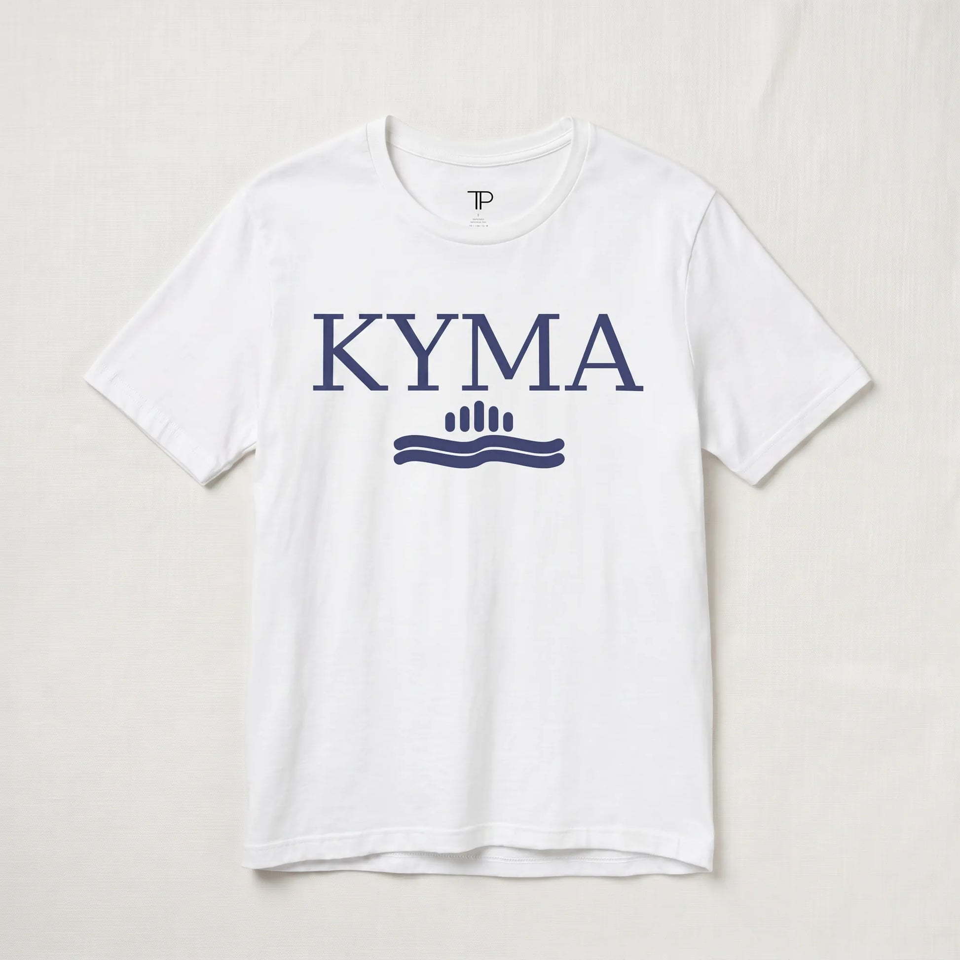 White t-shirt with 'KYMA' logo on a light gray background