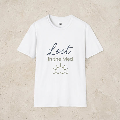 white t-shirt with 'Lost in the Med' text and sun graphic on a light beige background