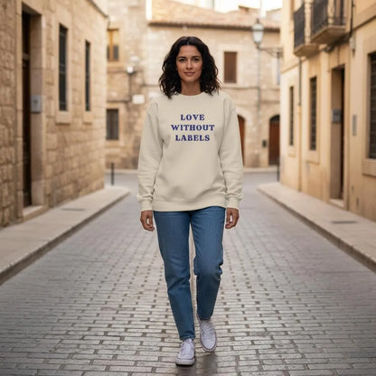 Model wearing Love Without Labels Greekify embroidered sweatshirt in an urban Mediterranean street-style scene