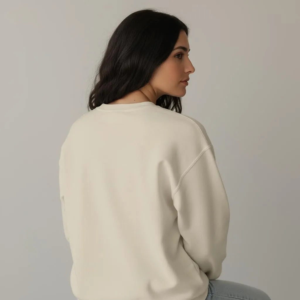Back view of Love Without Labels unisex embroidered crewneck sweatshirt showing relaxed fit and shoulder line