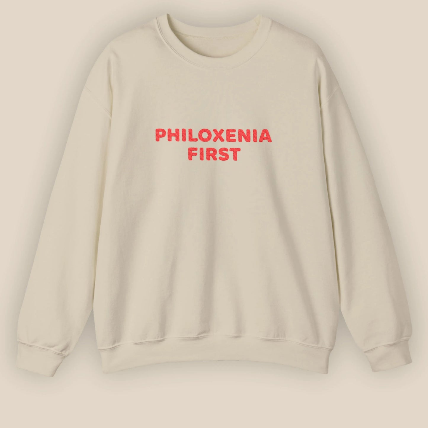 Flat lay of Philoxenia First Greek hospitality embroidered unisex crewneck sweatshirt by ToldPrint