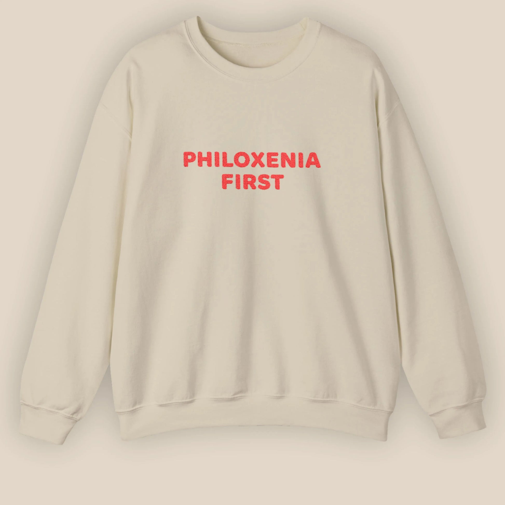 Flat lay of Philoxenia First Greek hospitality embroidered unisex crewneck sweatshirt by ToldPrint