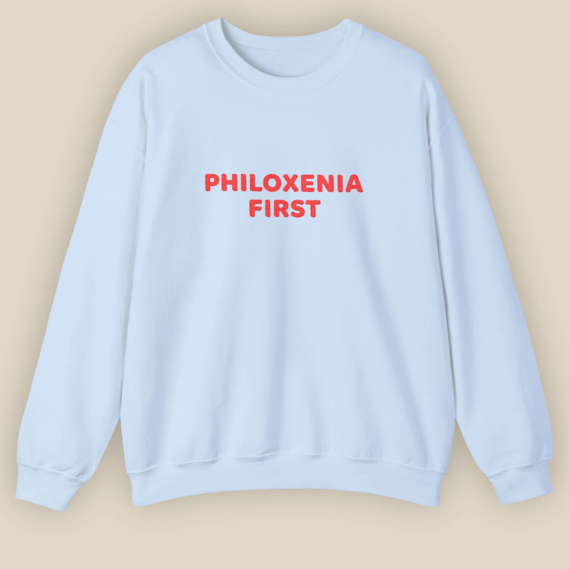 Flat lay of Philoxenia First Greek hospitality embroidered unisex crewneck sweatshirt by ToldPrint
