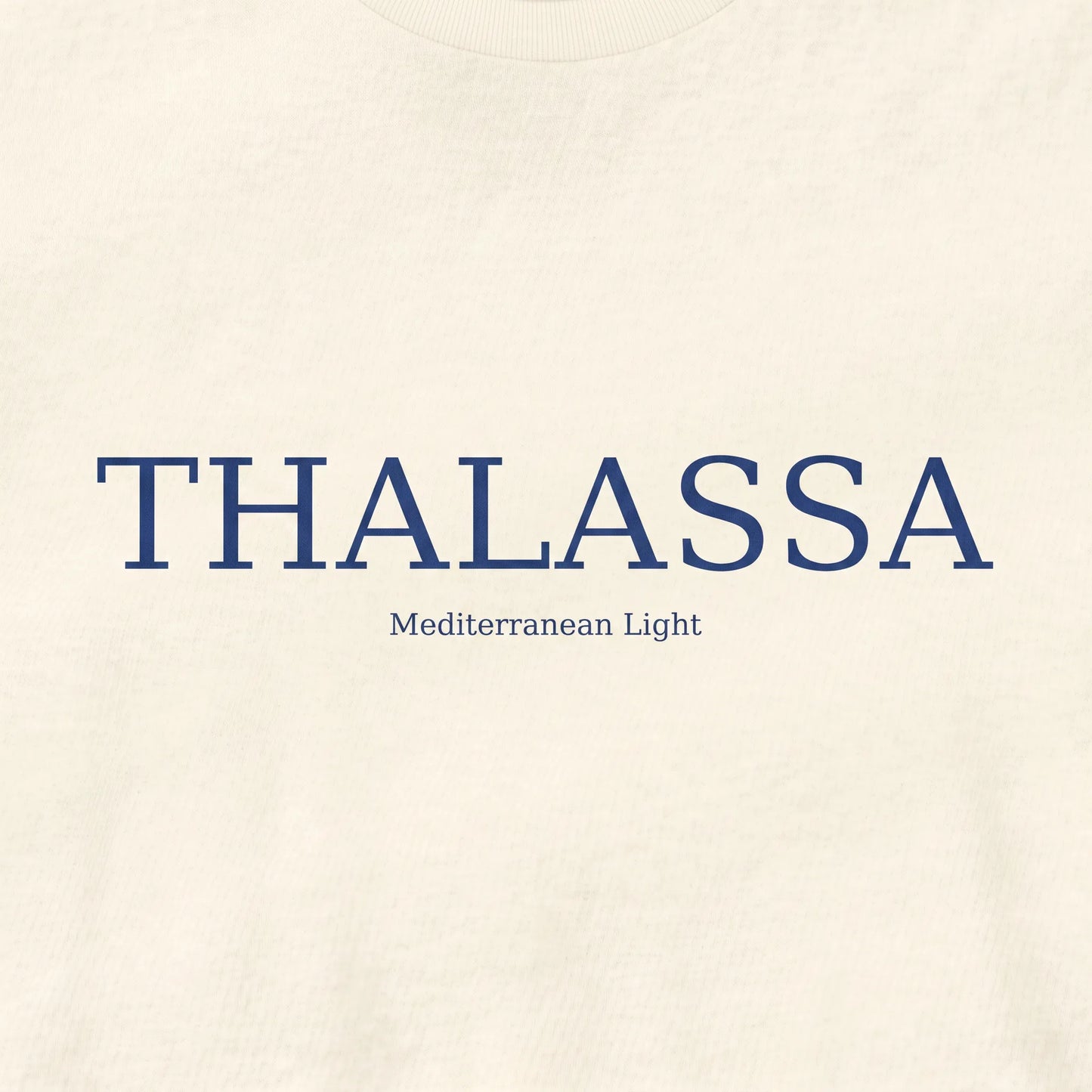 Text 'THALASSA Mediterranean Light' on a beige background
