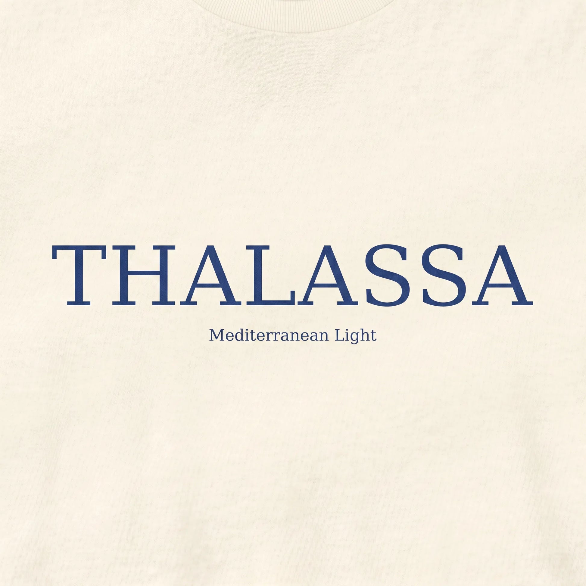 Text 'THALASSA Mediterranean Light' on a beige background