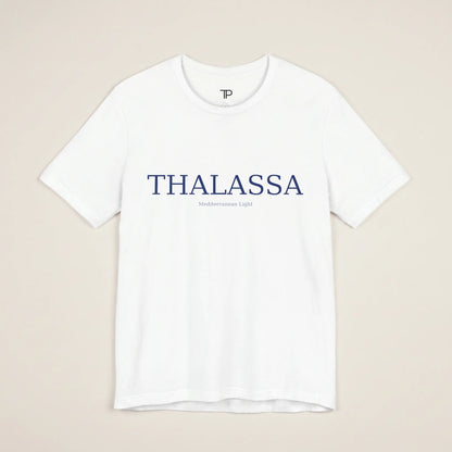 White t-shirt with 'THALASSA' text on a beige background