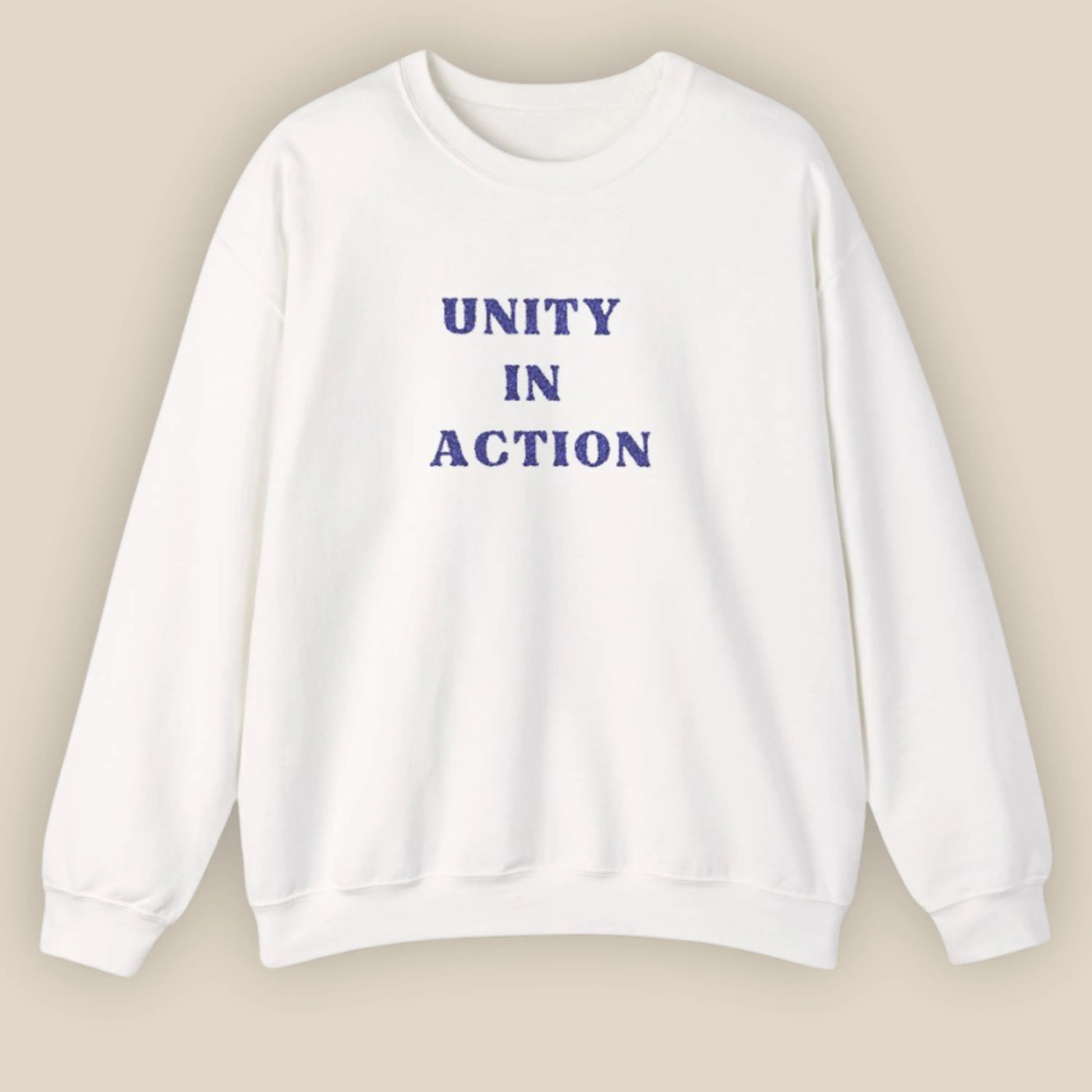 Flat lay of Unity in Action Greek solidarity slogan embroidered unisex hoodie by ToldPrint