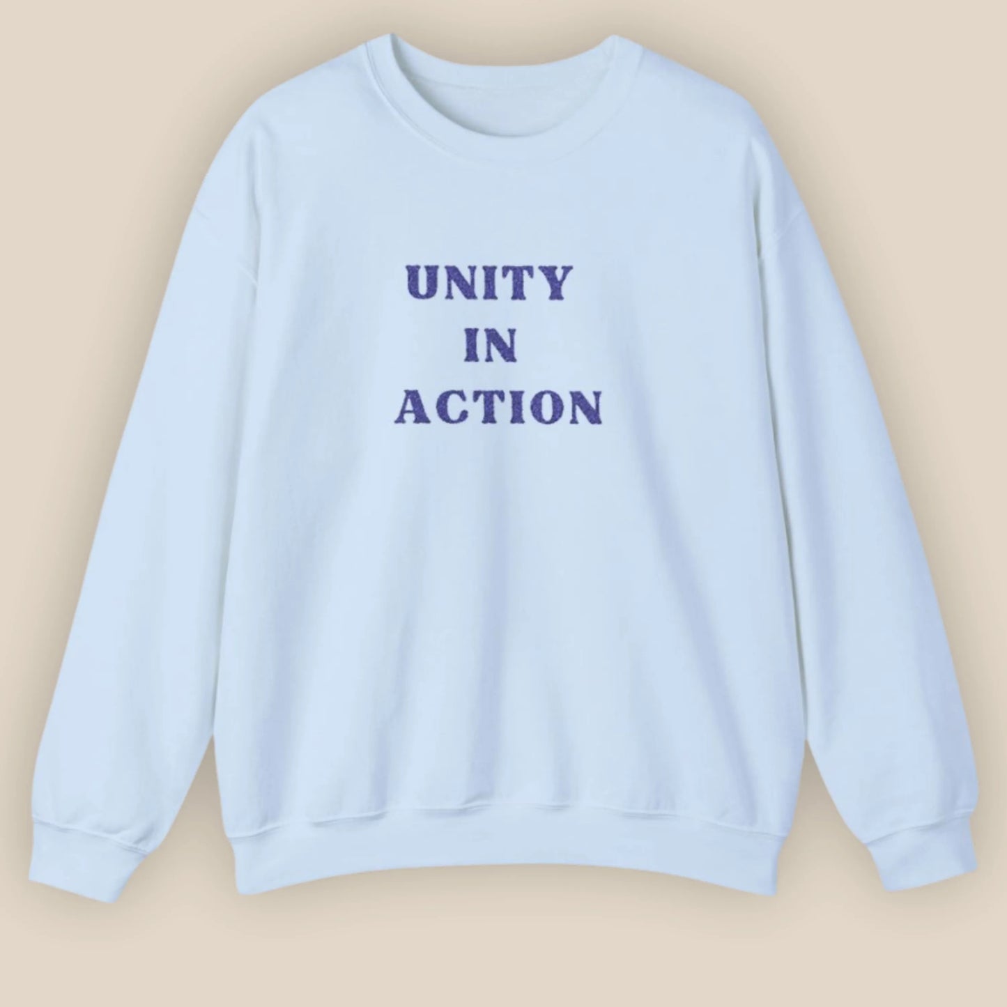 Flat lay of Unity in Action Greek solidarity slogan embroidered unisex hoodie by ToldPrint